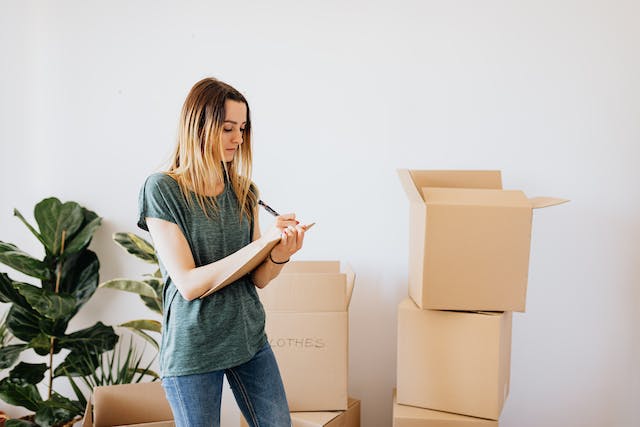 woman with moving boxes