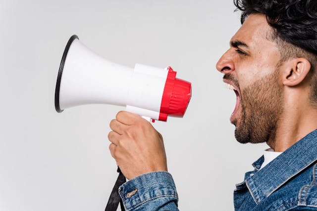 man using bullhorn